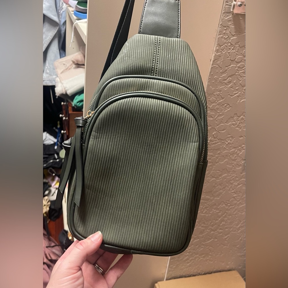 Hunter Green Crossbody bag with black strap and gold hardware